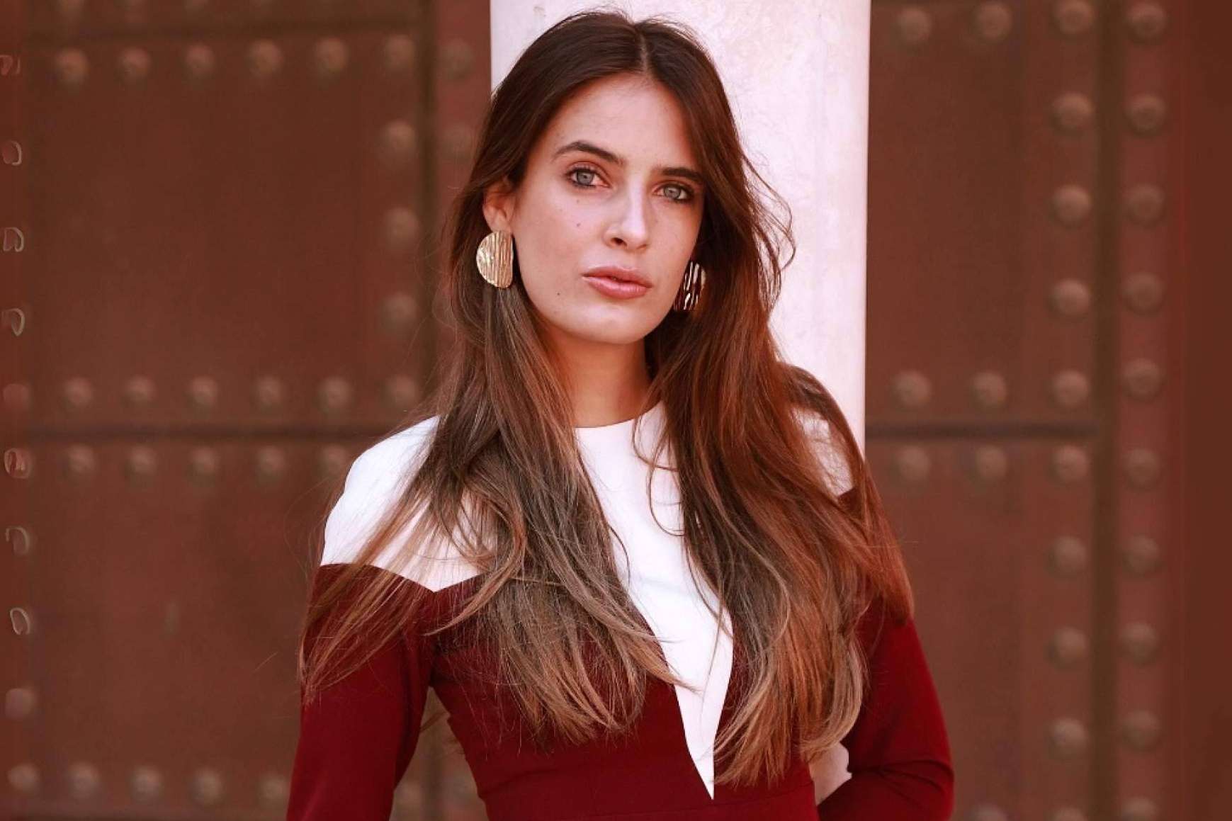 Tamara Falcó deslumbra con un vestido de invitada de otoño de Cayro para una boda